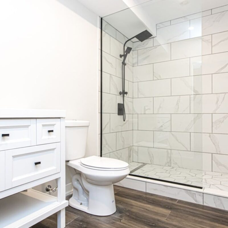 Renovated bathroom with white tile