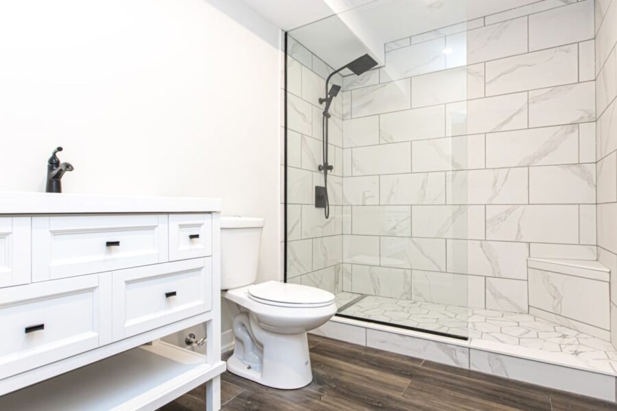 Renovated bathroom with white tile